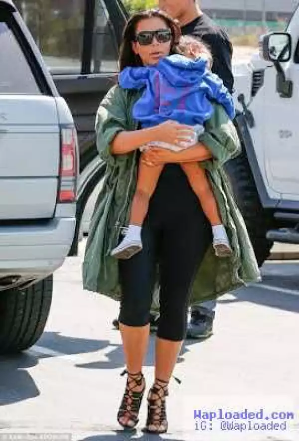 Kim K takes a tired North West to the roller rinks